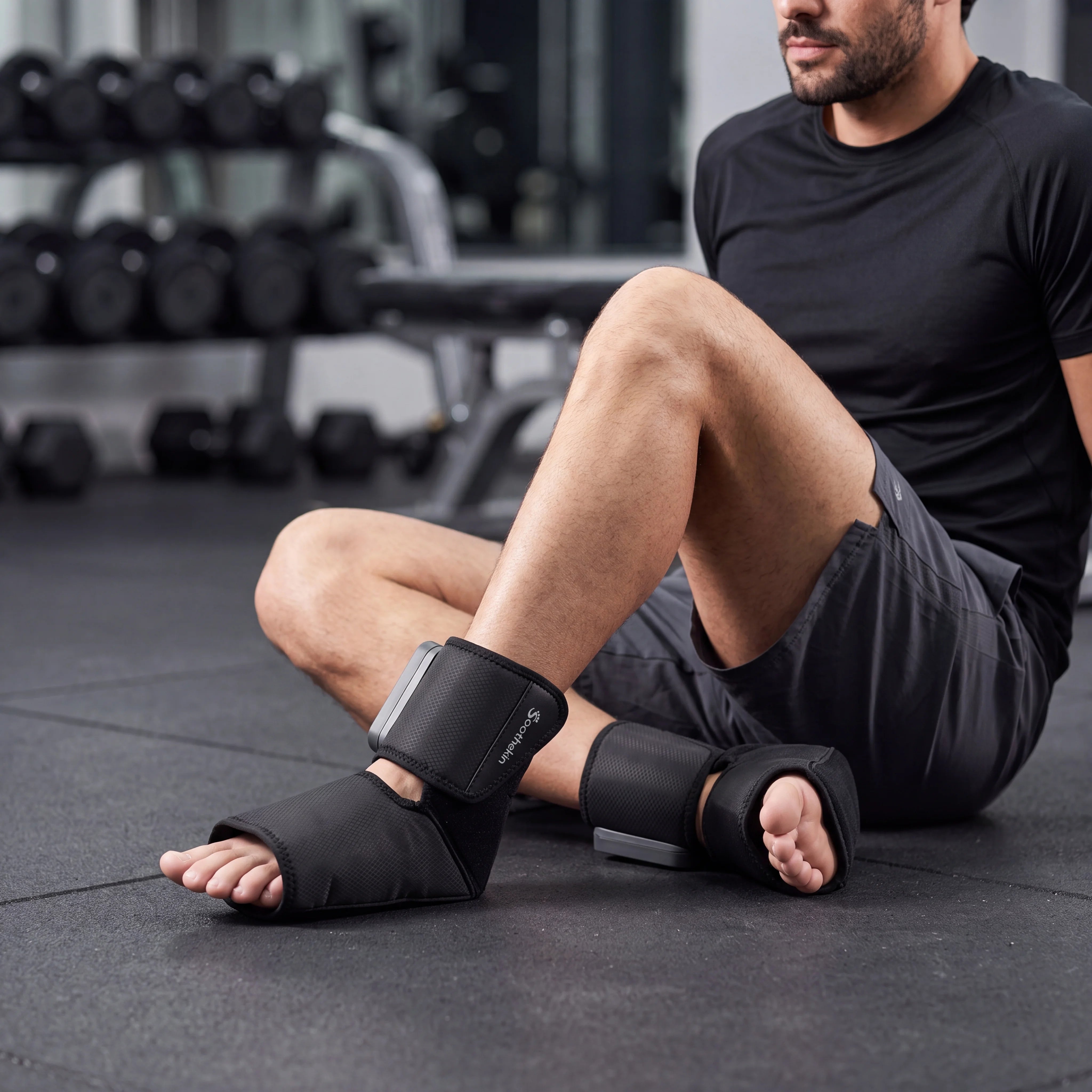 Person using Soothekin foot and ankle massager for post-workout recovery